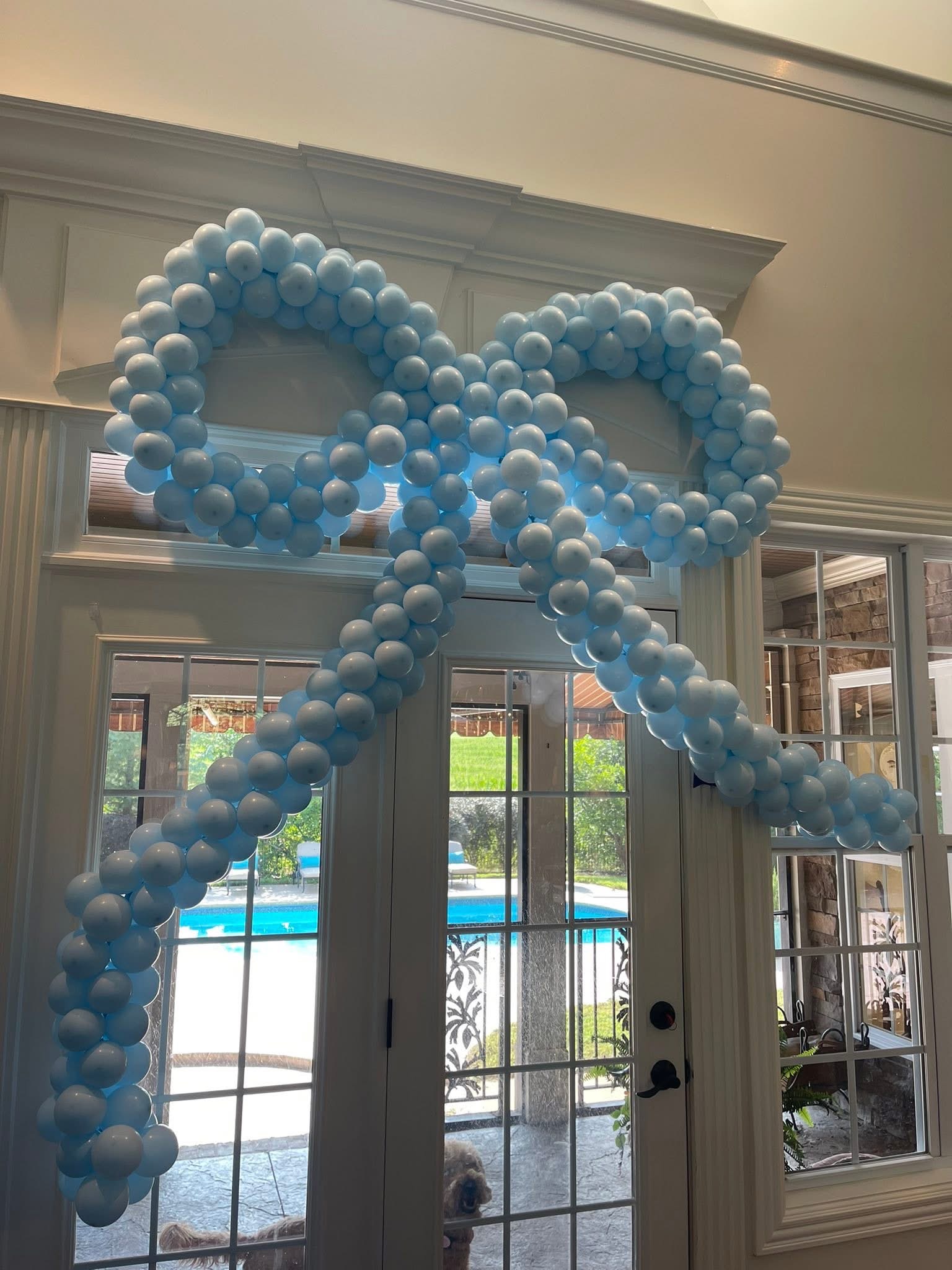 Blue bow balloon
